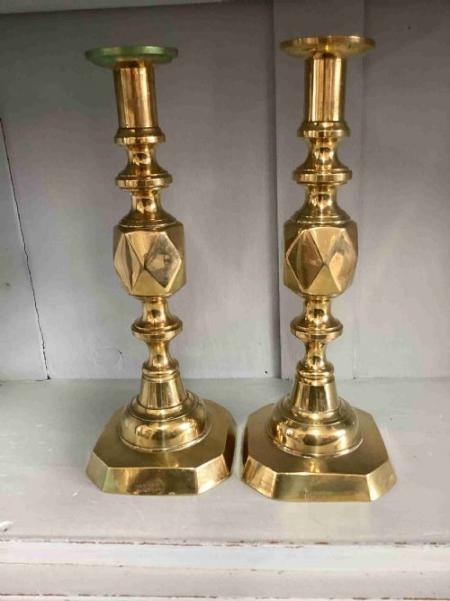 A pair of Victorian King of Diamonds Brass candlesticks 