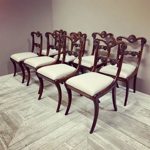 A Set of Eight Early C19th Simulated Rosewood Dining Chairs