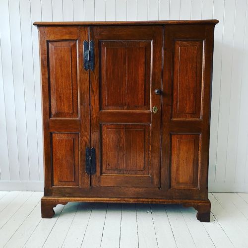 A Georgian Oak Hall Cupboard