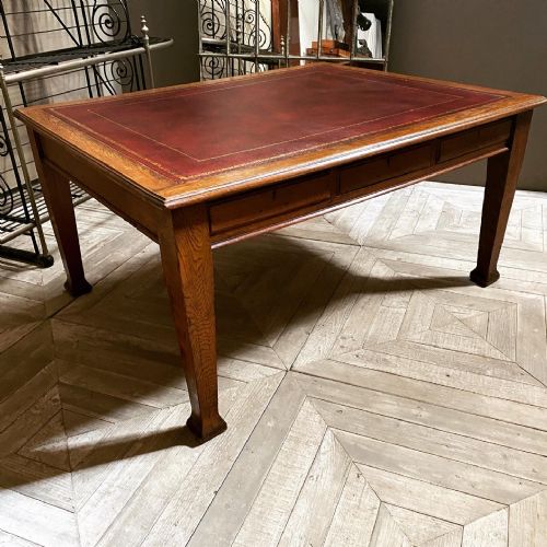 A Large Oak Six Drawer Library Table