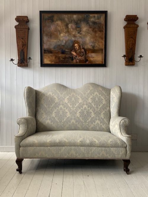 A Queen Anne Style Wingback Sofa Circa 1920