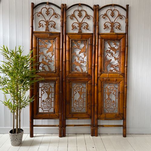 A Vintage Bamboo and Inset Iron Three Fold Screen