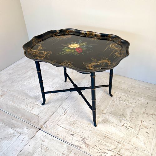 A Regency Japanned Papier-mache Tray Table by Jennens and Bettridge