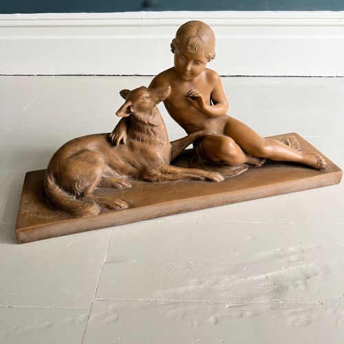 A Terracotta Study of a Child and Dog by Ugo Cipriani