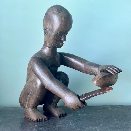 An Early 20th Century African Carved Wood Ngoni Figure
