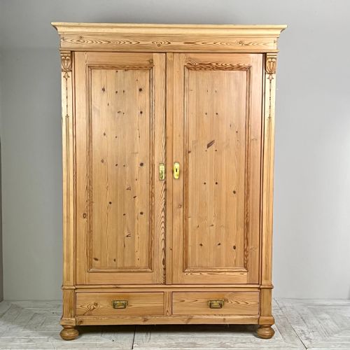 A Continental Pine Art Nouveau Knockdown Wardrobe