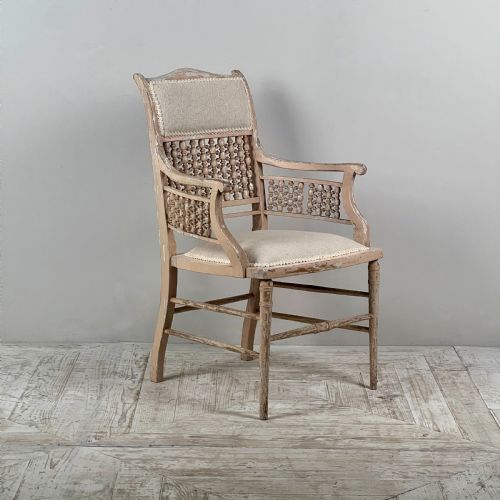 fig 1. A Liberty & Co. Moorish Arts And Crafts Armchair