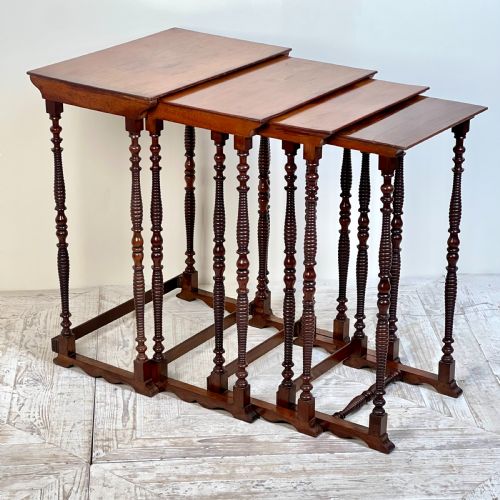A Quartet Nest of Walnut Bobbin Tables