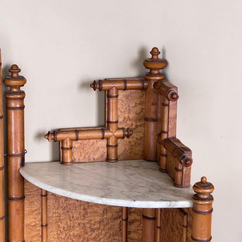 fig 5. Late 19th-century French faux-bamboo birds-eye maple washstand featuring a central mirror, side shelf tiers, marble splashback and surface, over two drawers and a double cupboard.