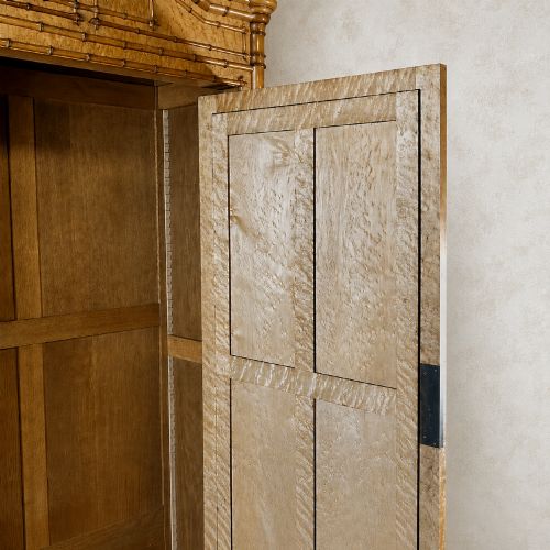 fig 3. French birds eye maple single door armoire featuring faux bamboo turned mouldings, a full-length mirrored panel, base drawer, and carved cresting.