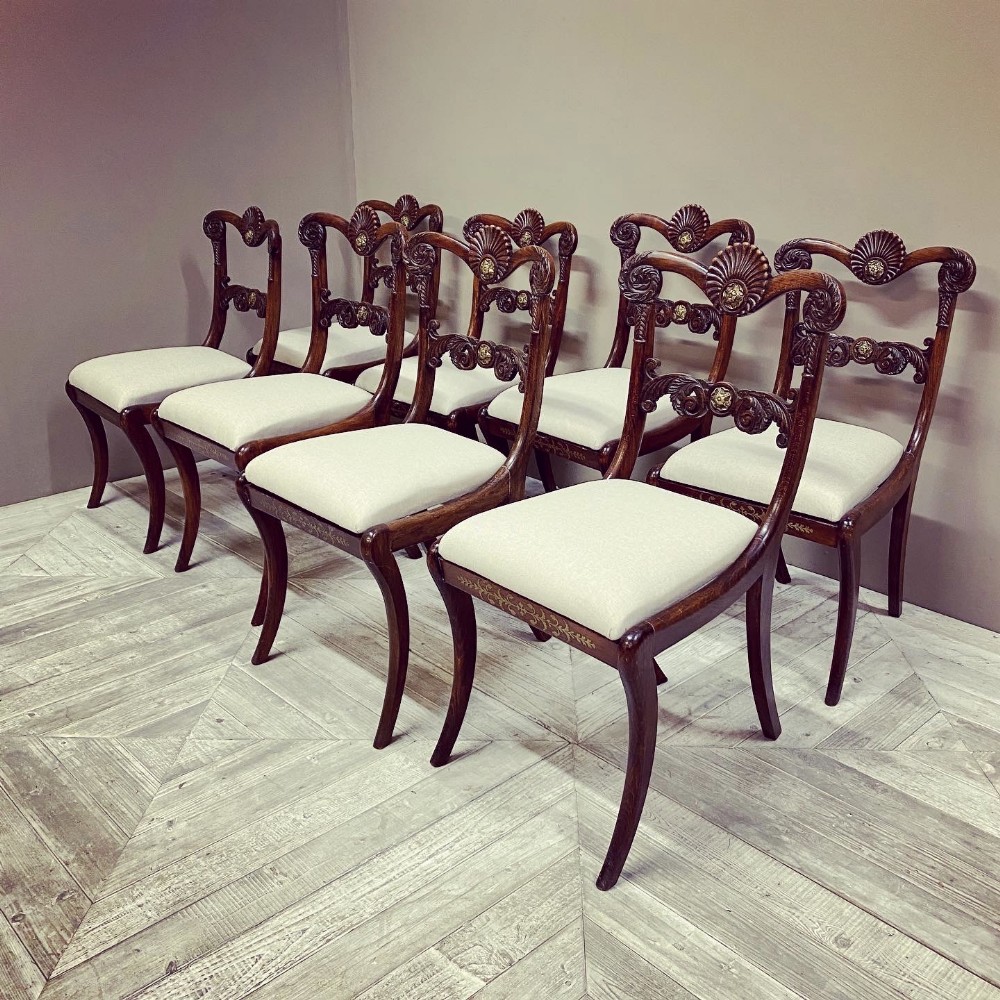 A Set of Eight Early C19th Simulated Rosewood Dining Chairs