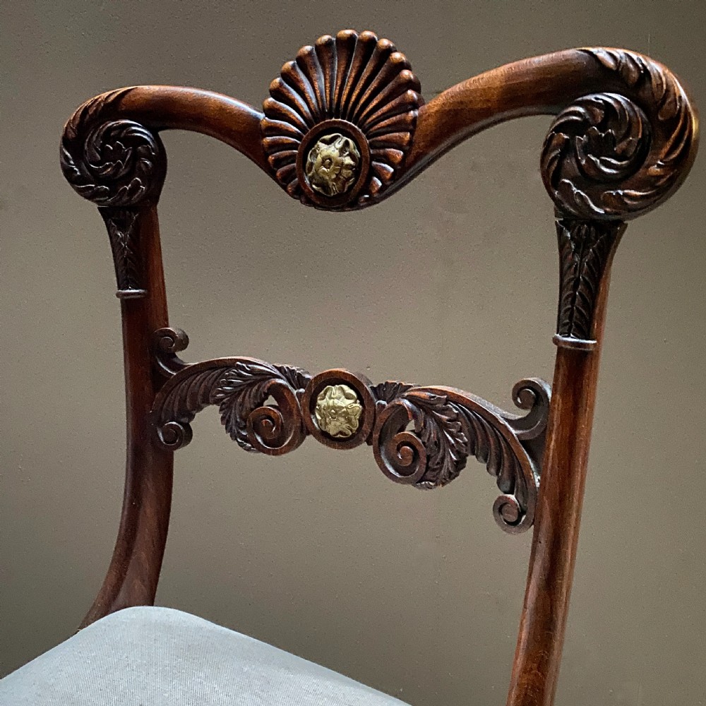 A Set of Eight Early C19th Simulated Rosewood Dining Chairs View II