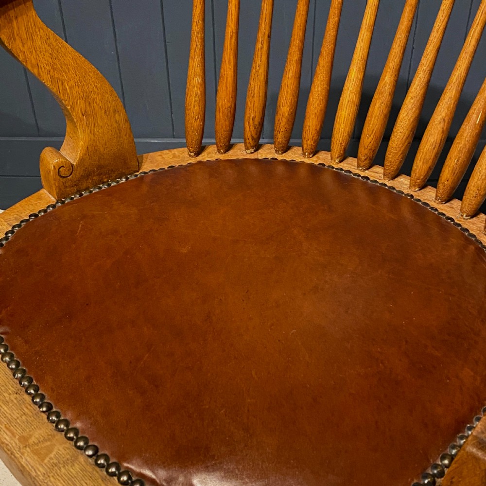 An Edwardian Blonde Oak and Leather Desk Chair View III