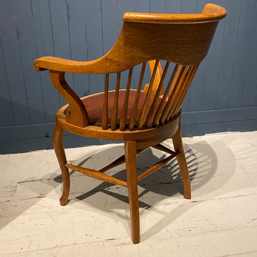 An Edwardian Blonde Oak and Leather Desk Chair View IV