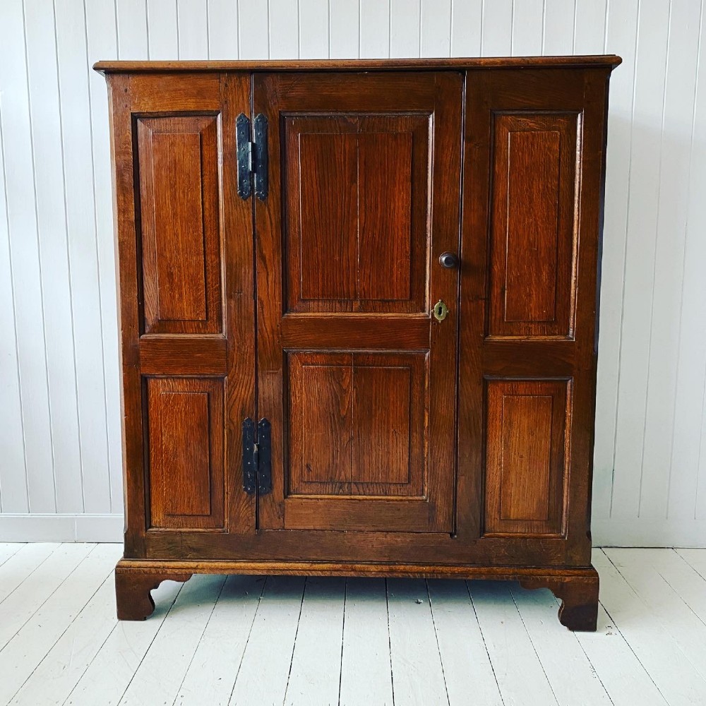 A Georgian Oak Hall Cupboard