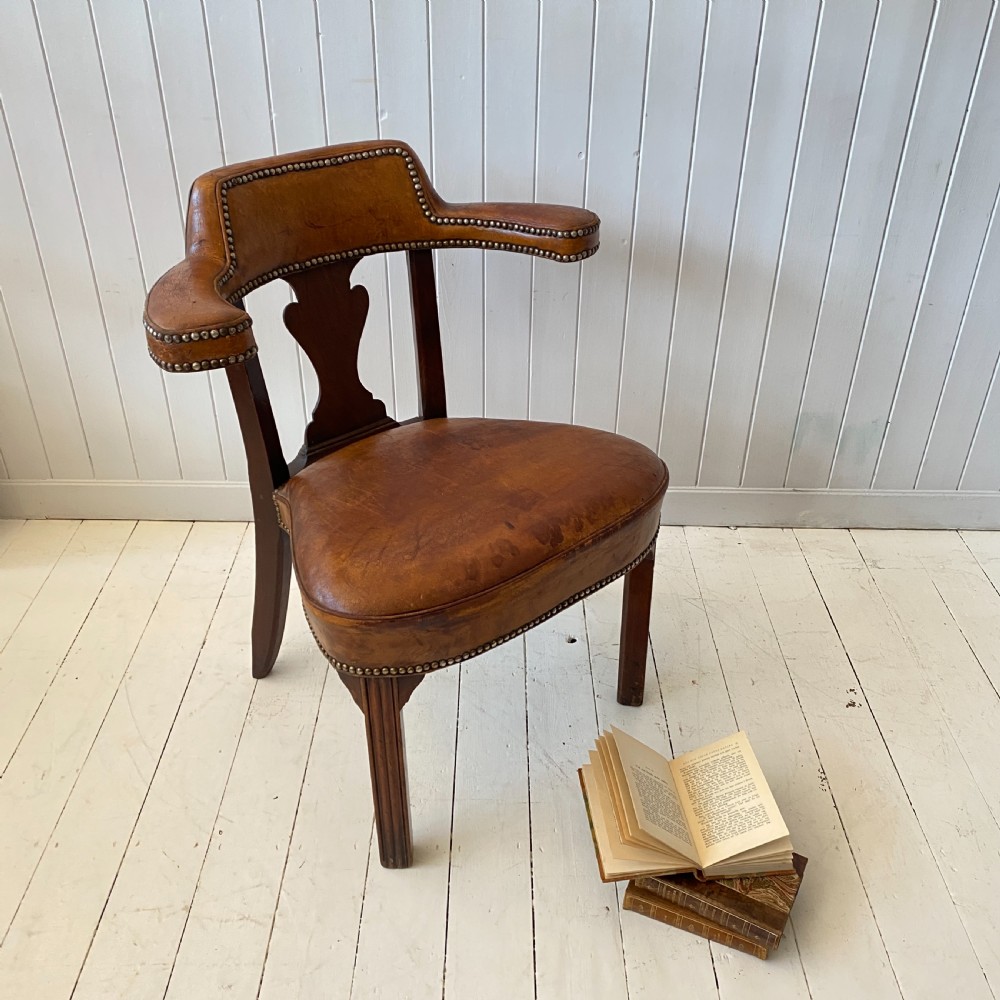 A Mahogany and Leather Library Chair  View II