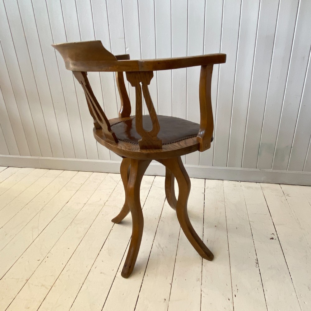 An Elm and Leather Swivel Desk Chair  View VI