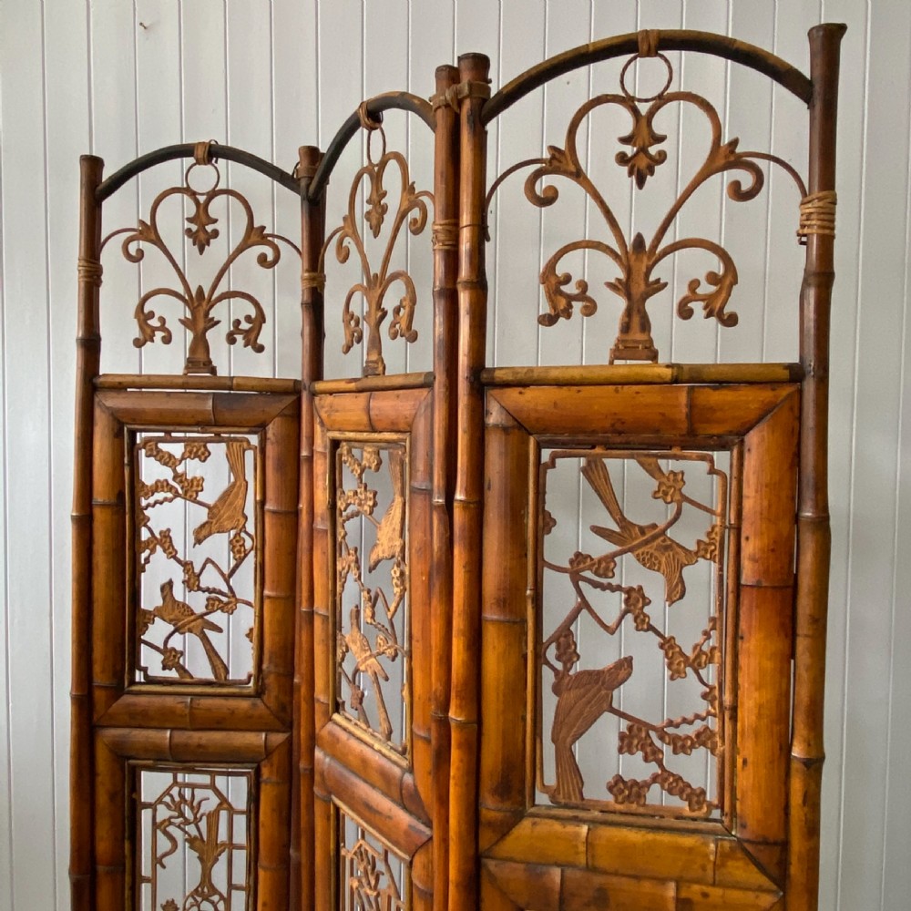 A Vintage Bamboo and Inset Iron Three Fold Screen View VI