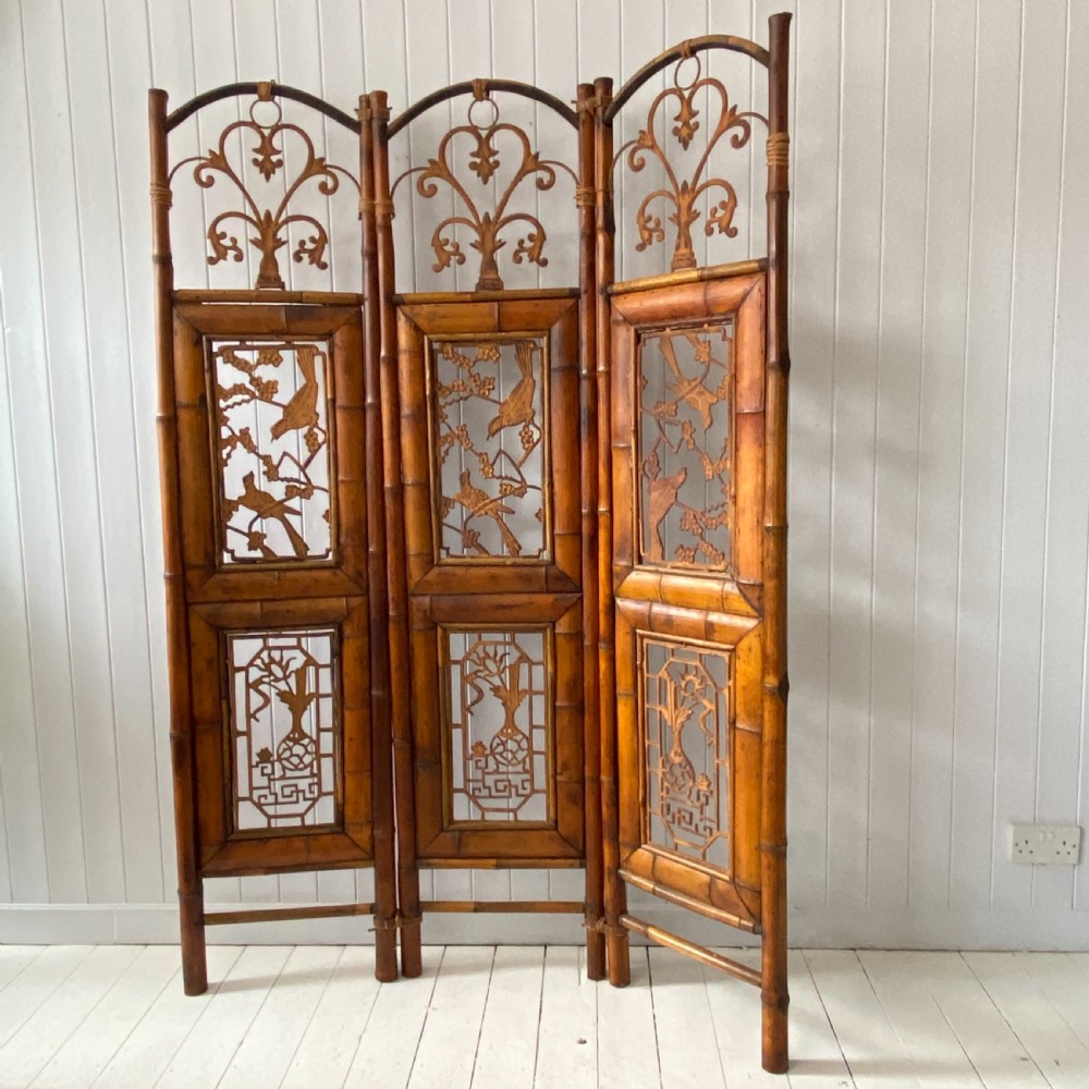 A Vintage Bamboo and Inset Iron Three Fold Screen View VII