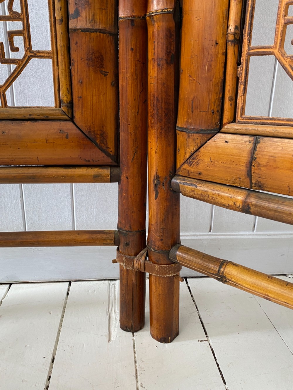 A Vintage Bamboo and Inset Iron Three Fold Screen View XI