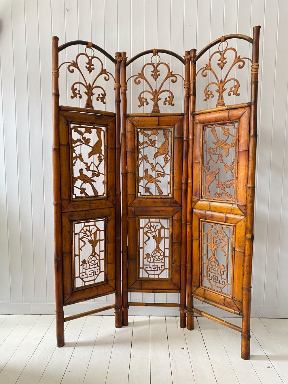 A Vintage Bamboo and Inset Iron Three Fold Screen View XII
