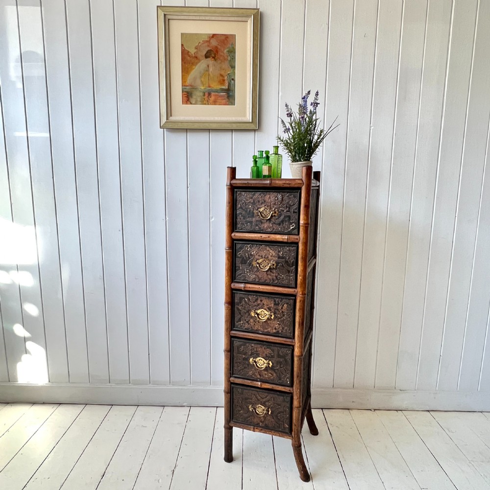 Bamboo and Embossed Leather Bank of Drawers Circa 1900 View II
