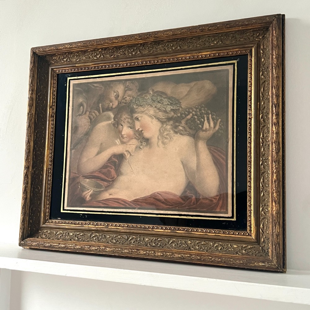 An 18th-century classical etching depicting Eros and mythological figures, mounted in a dark border and an ornate gilded frame. View II