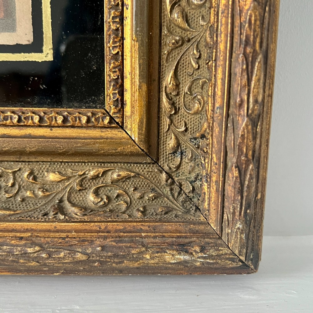 An 18th-century classical etching depicting Eros and mythological figures, mounted in a dark border and an ornate gilded frame. View III