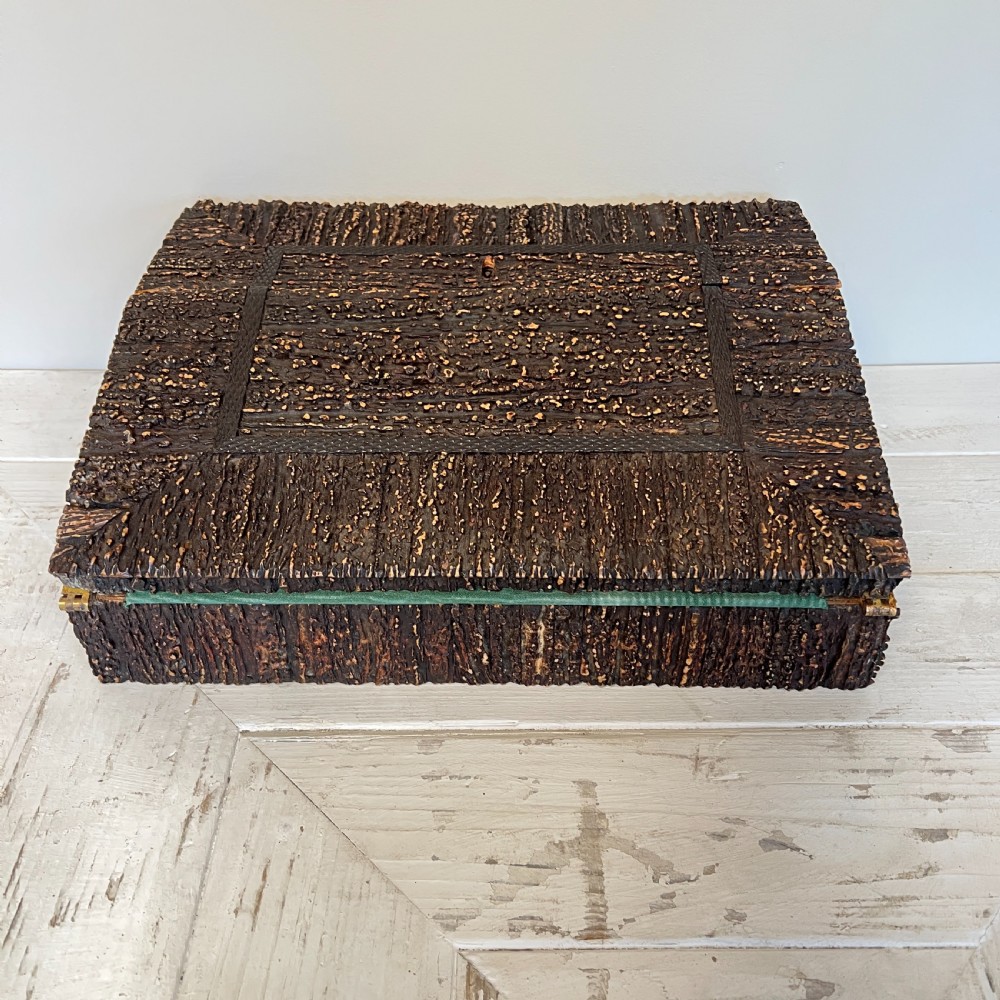 An open nineteenth-century Anglo-Indian writing slope displaying carved antler borders, floral bone inlay, and a green velvet writing surface. View II