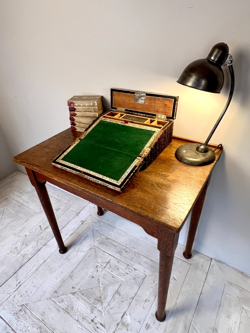 An open nineteenth-century Anglo-Indian writing slope displaying carved antler borders, floral bone inlay, and a green velvet writing surface. View VIII