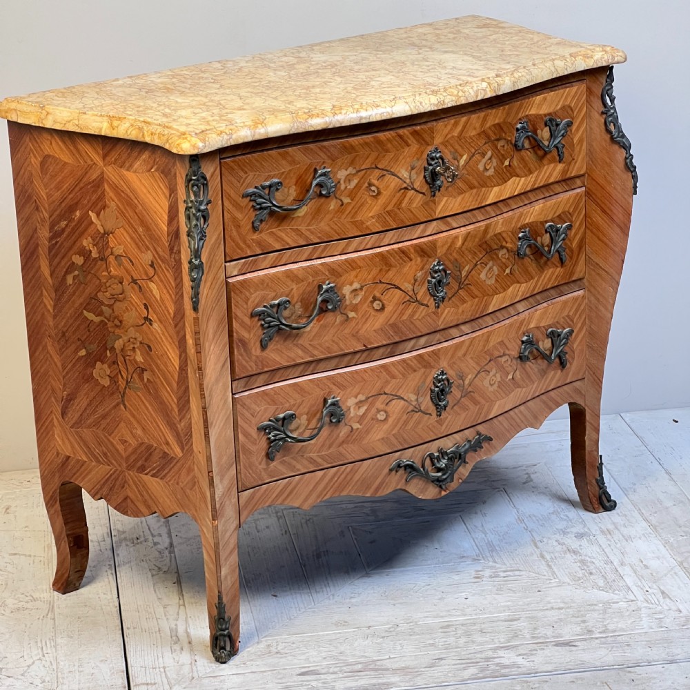 A Parisian Louis XV Style Marquetry And Sienna Marble Top Chest Of Drawers