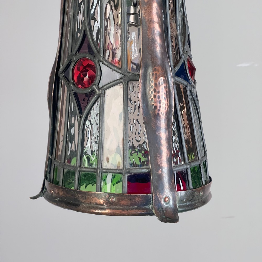 An Arts And Crafts Patinated Copper And Leaded Glass Hall Lantern View II