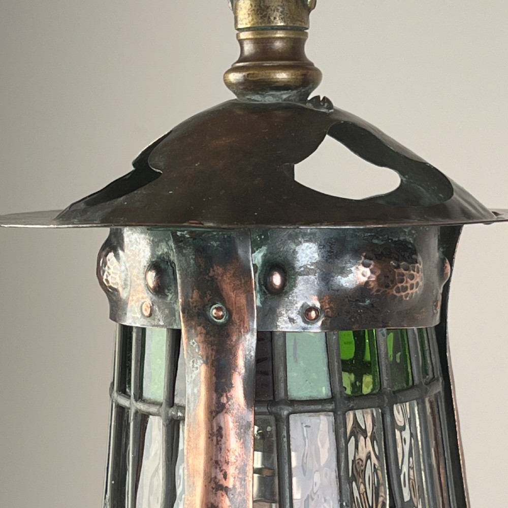 An Arts And Crafts Patinated Copper And Leaded Glass Hall Lantern View V