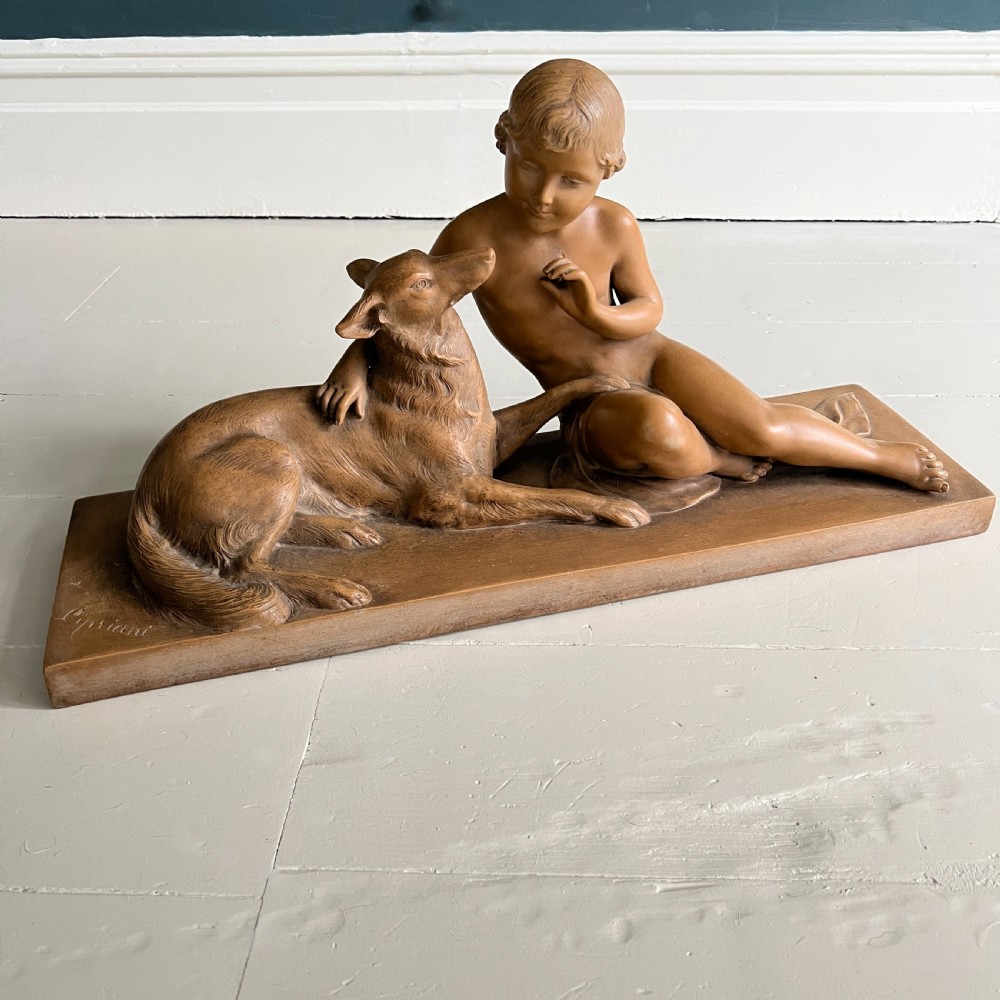 A Terracotta Study Of A Child and Dog By Ugo Cipriani