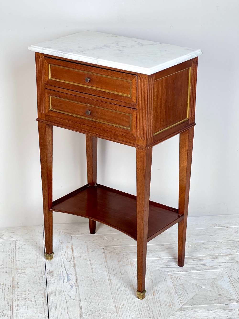 A Pair Of Mahogany And Brass Inlay Marble Topped Bedside Tables View II