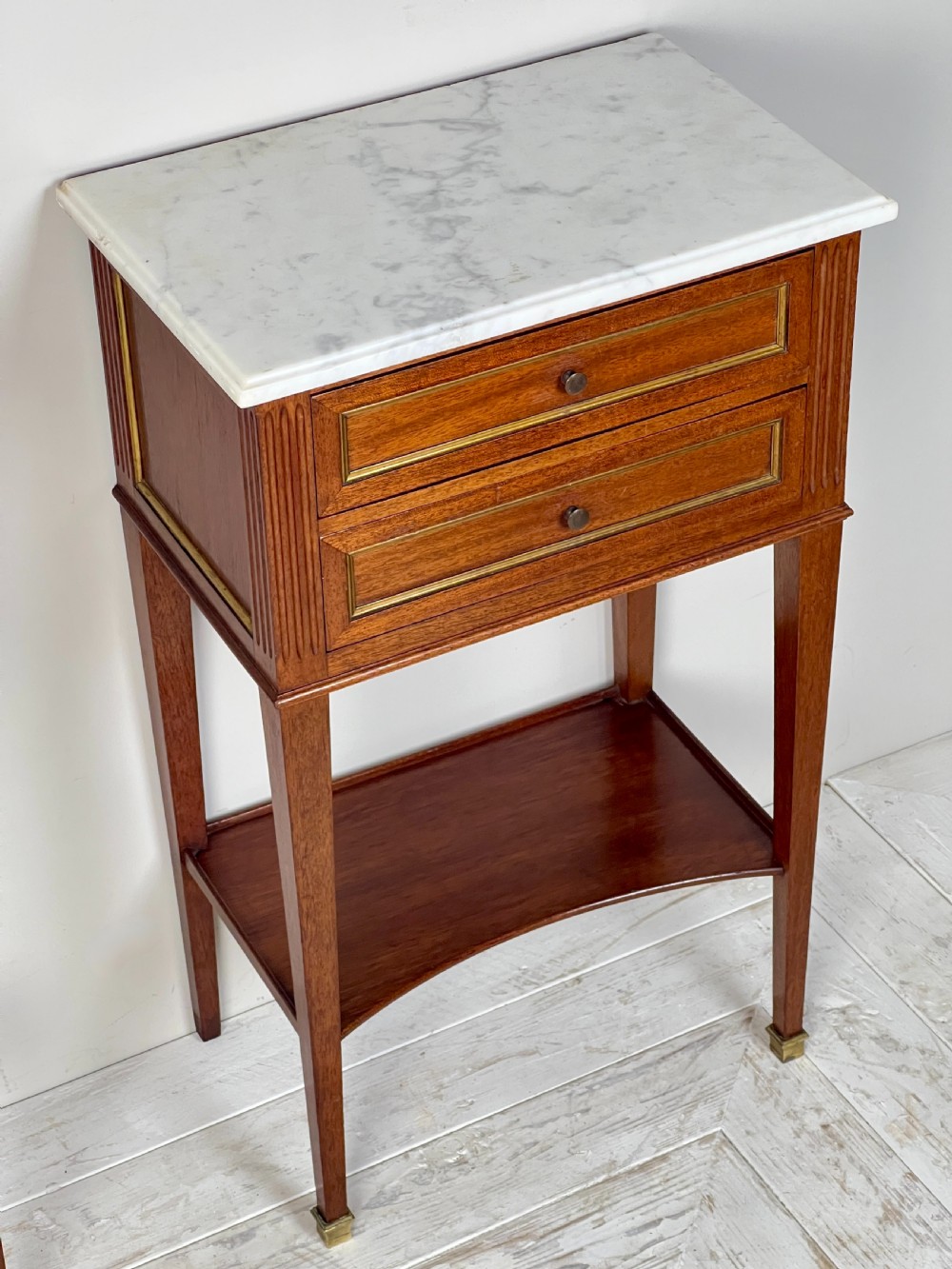 A Pair Of Mahogany And Brass Inlay Marble Topped Bedside Tables View III