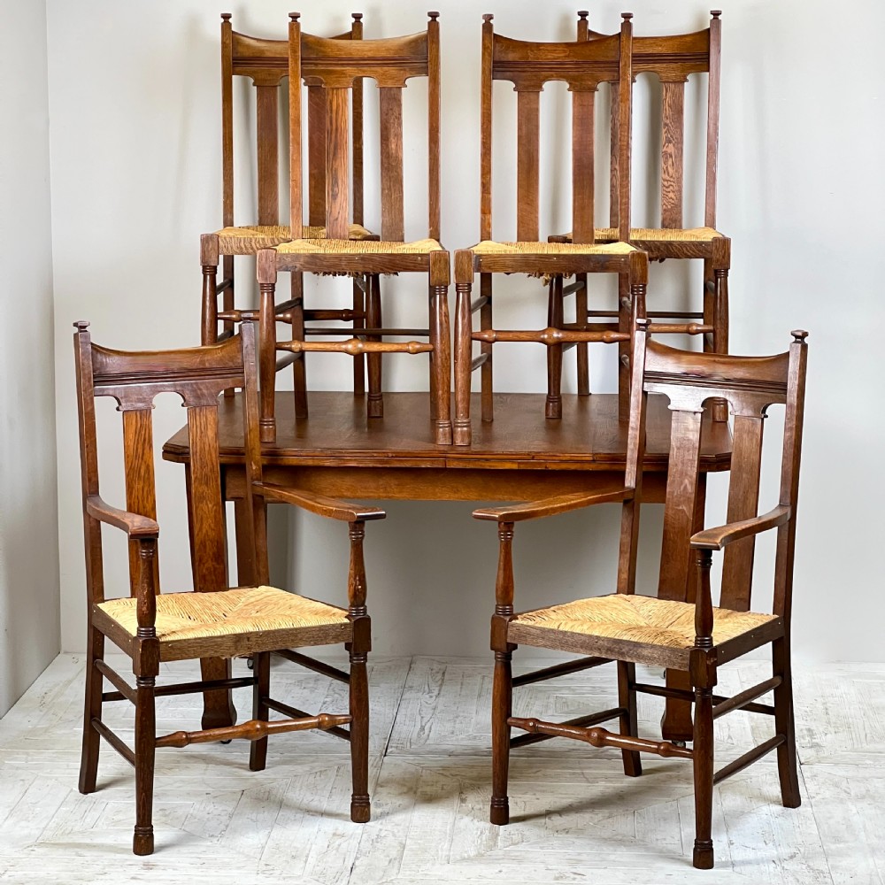 An Arts & Crafts Extending Oak Dining Table & Six Chairs View IV