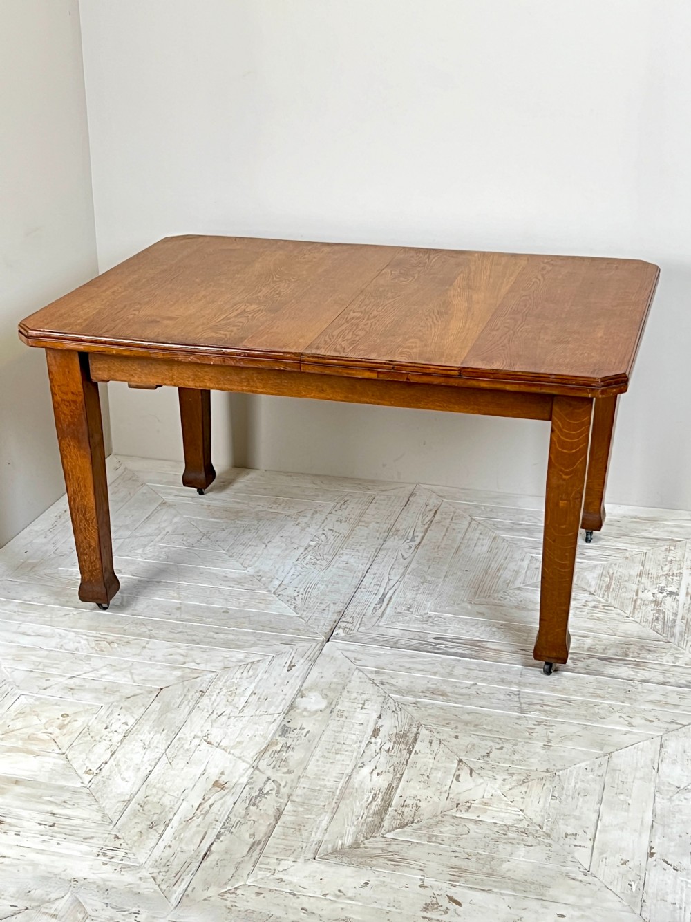 An Arts & Crafts Extending Oak Dining Table & Six Chairs View V