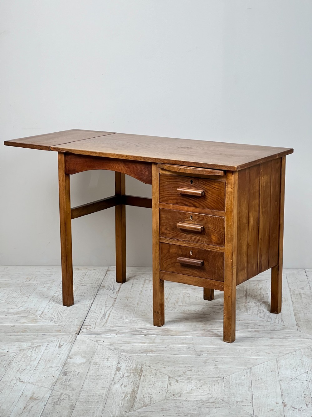A Vintage English Oak Drop Leaf Desk