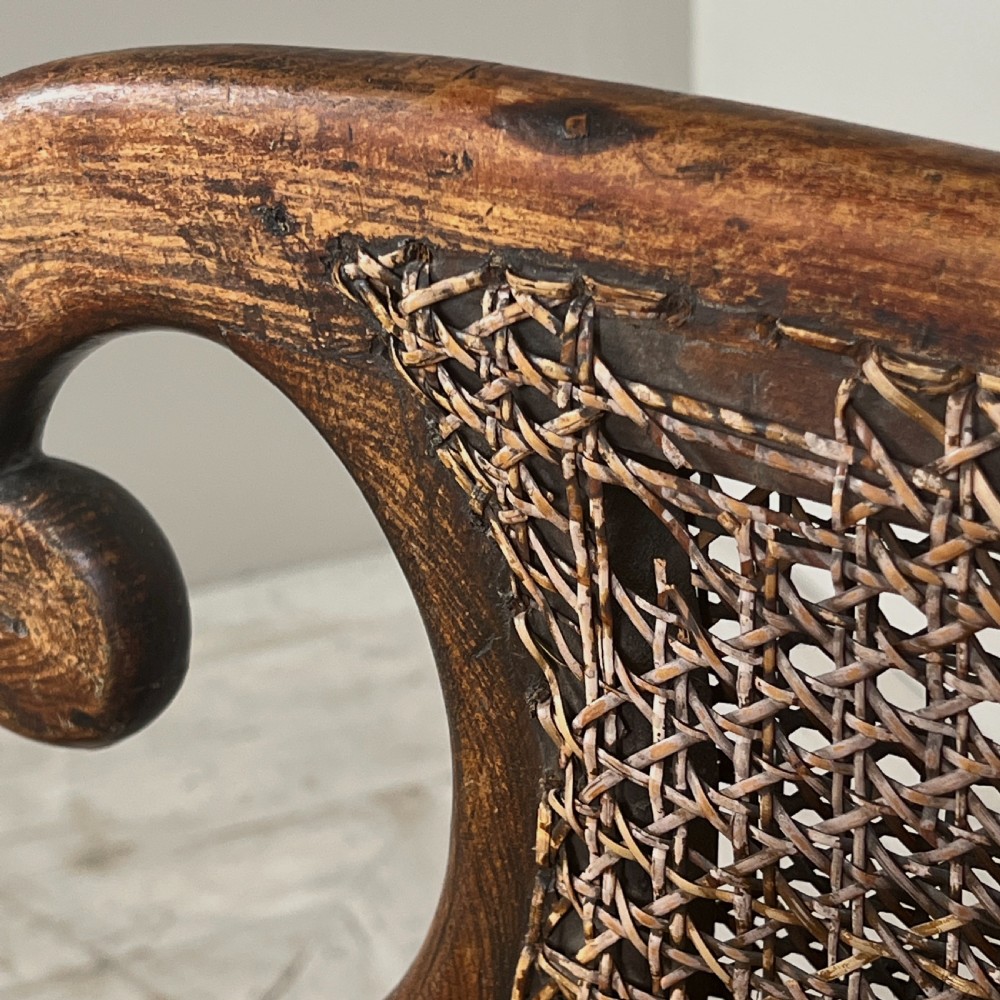 A Regency Simulated Rosewood And Cane Chaise Longue View VI