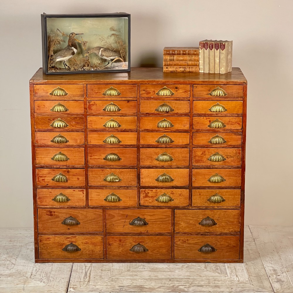 A Bank Of Graduated Chemist Drawers Circa 1890 View II
