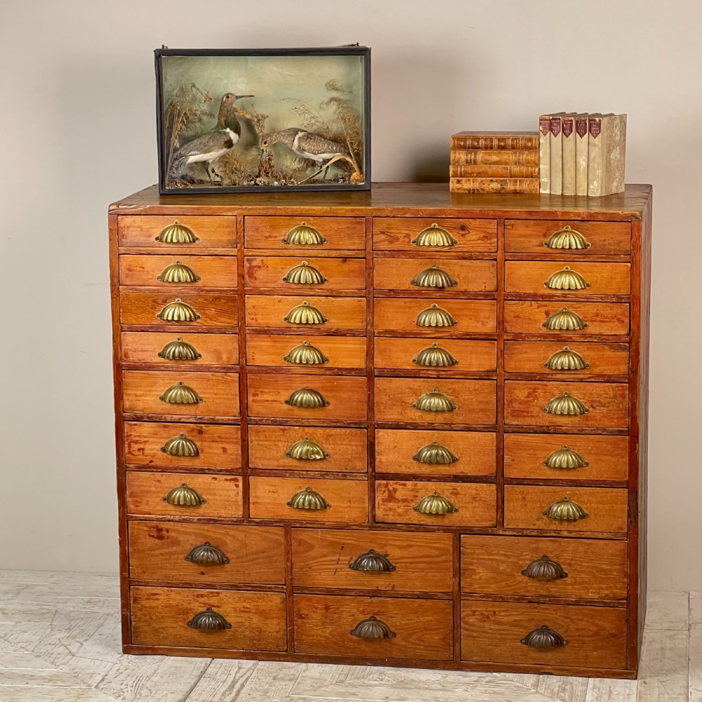 A Bank Of Graduated Chemist Drawers Circa 1890 View III