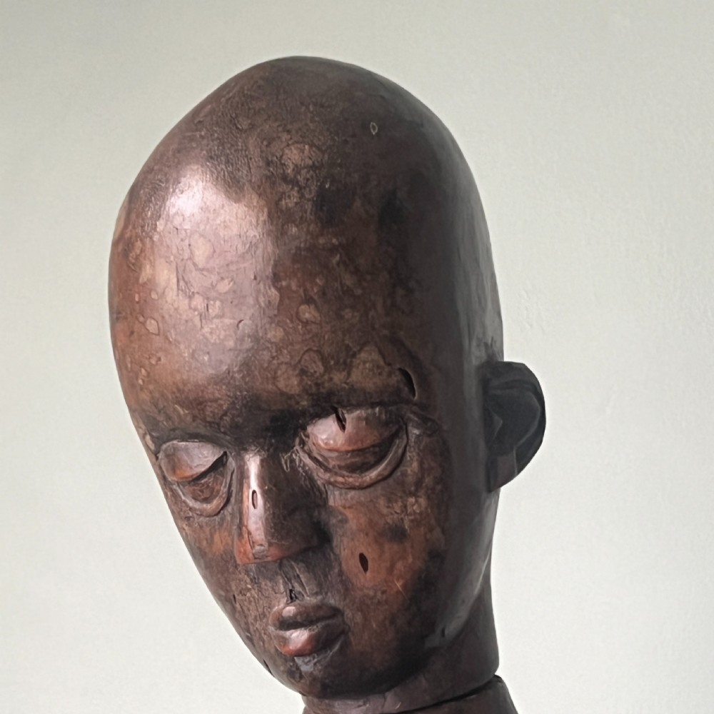 An Early 20th Century African Carved Wood Ngoni Figure View IV