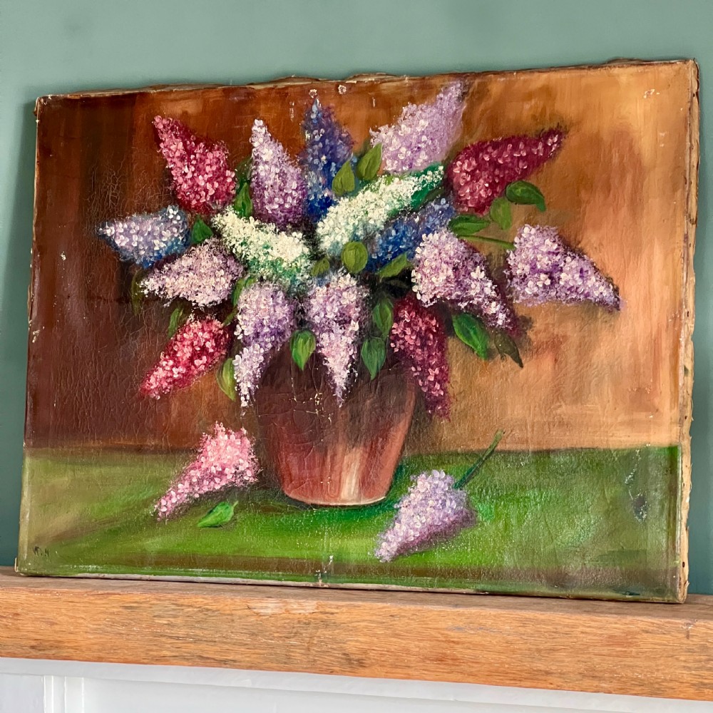 A textured impasto oil painting on canvas depicting a arrangement of purple, pink, and white lilacs in a brown vase. View III