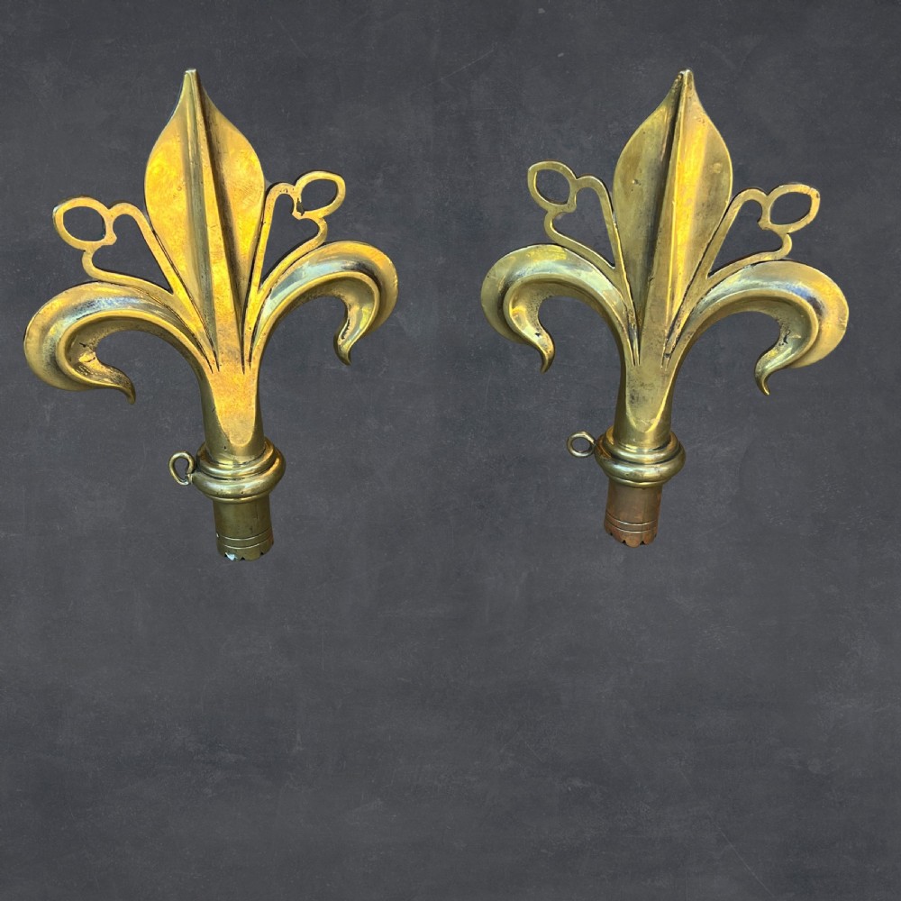 A Pair Of Arts & Crafts Polished Bronze Fleur De Lys Pole Ends Or Finials View II