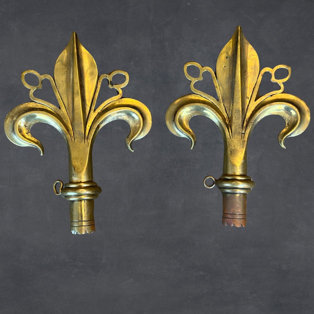 A Pair Of Arts & Crafts Polished Bronze Fleur De Lys Pole Ends Or Finials View III