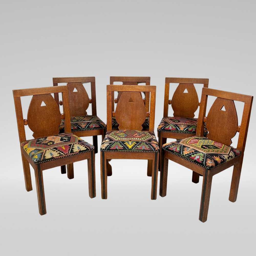 A Set Of Six Oak Art Deco And Kilim Dining Chairs