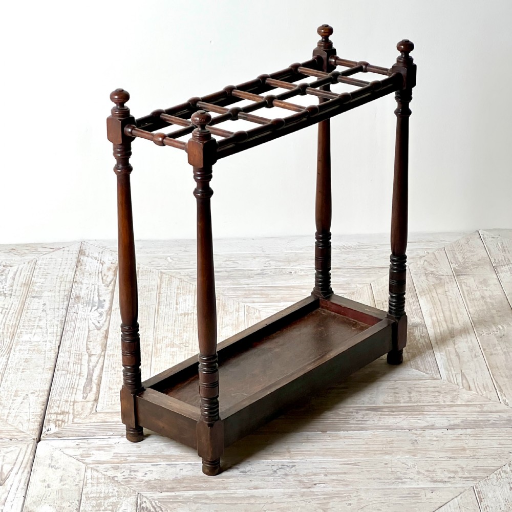 An Edwardian Heals Of London Walnut Stick or Umbrella Stand
