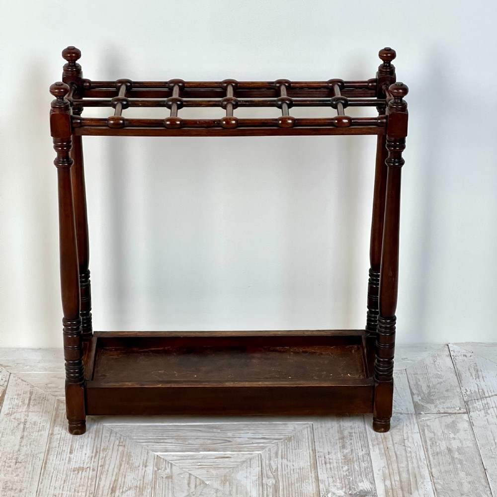 An Edwardian Heals Of London Walnut Stick or Umbrella Stand View IV