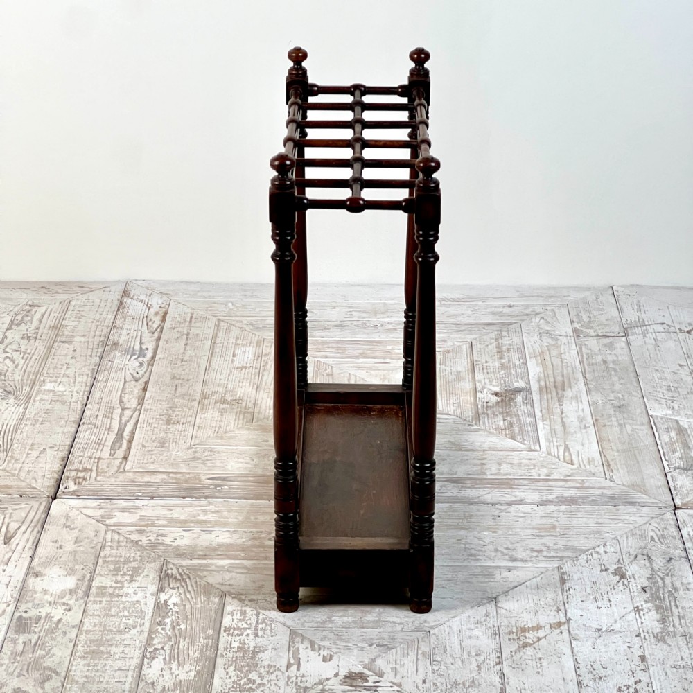 An Edwardian Heals Of London Walnut Stick or Umbrella Stand View VI